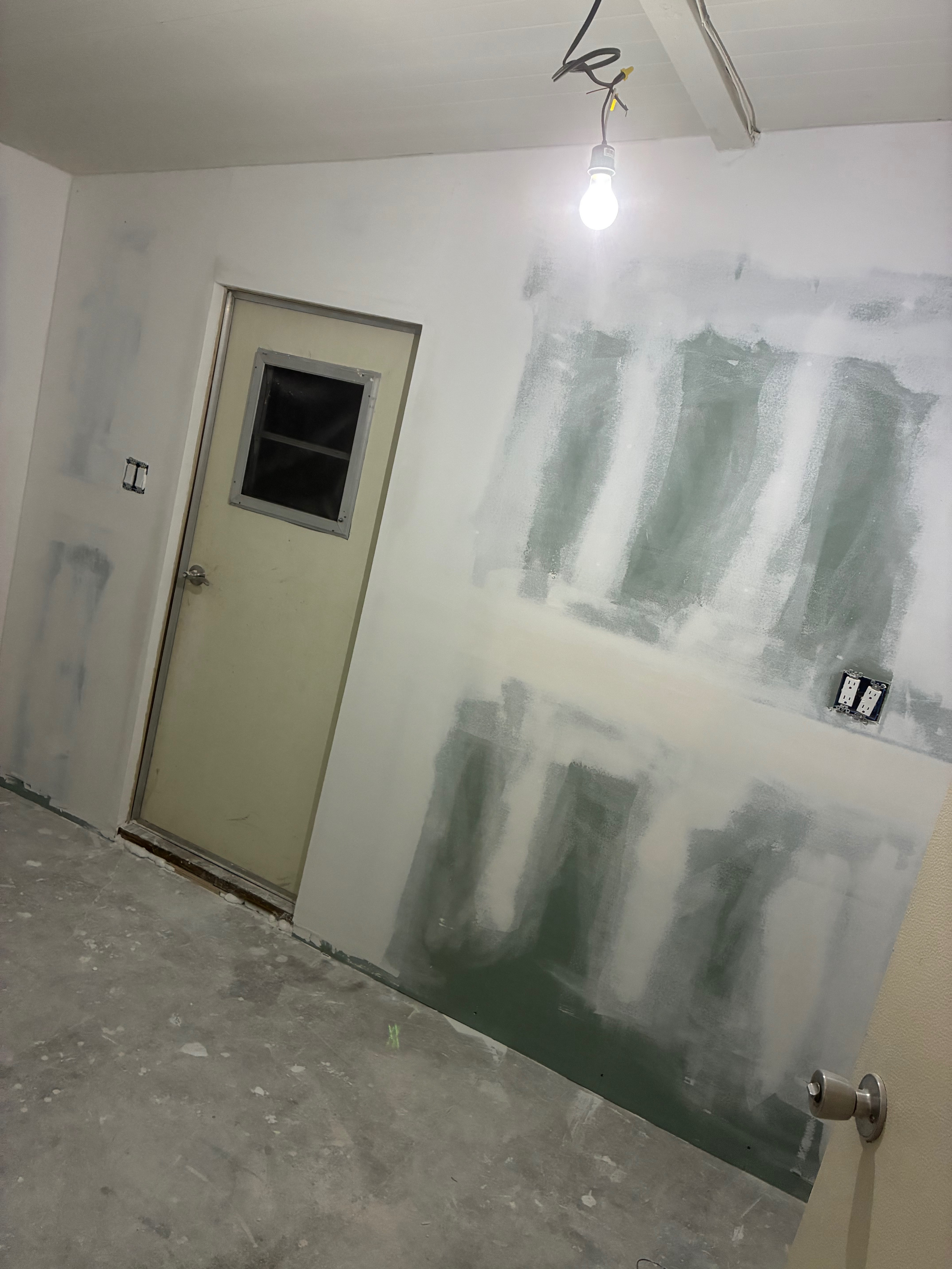 Garage wall repair and drywall - after